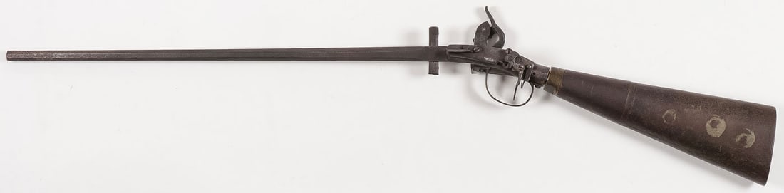 RARE EXPOSED LOCK BUTT RESERVOIR AIR GUN, 19TH C: RARE EXPOSED LOCK BUTT RESERVOIR AIR GUN, 19TH C. Comprising a European outside lock air gun with 24.25 inch screw off tapered octagon barrel with front blade sight and sliding loading bar with ball s