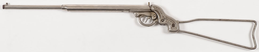 RARE DAISY 3RD MODEL AIR GUN: RARE DAISY 3RD MODEL AIR GUN. Break open round barrel, single shot air rifle with nickel plated tubing and air chamber. Cast iron frame with raised text on left side "Pat May 6-90 July 14-91 Daisy". R