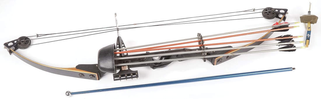 VINTAGE JENNINGS LEFT HAND COMPOUND BOW: VINTAGE JENNINGS LEFT HAND COMPOUND BOW. Comprising a vintage Jennings laminated and metal left-handed compound bow, length 44 inches. Serial number 83227.SHIPPING NOTICE:Except for large, oversized