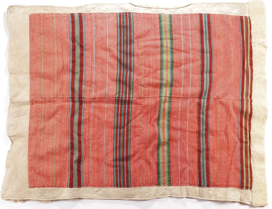 TWO SCANDINAVIAN LAP BLANKETS/RUGS: TWO SCANDINAVIAN LAP BLANKETS/RUGS. Of traditional design with embroidered bands on a sheepskin fur hide. Excellent condition. The largest 70.75 inches x 57 inches, the other 66.25 inches x 52.25 inch