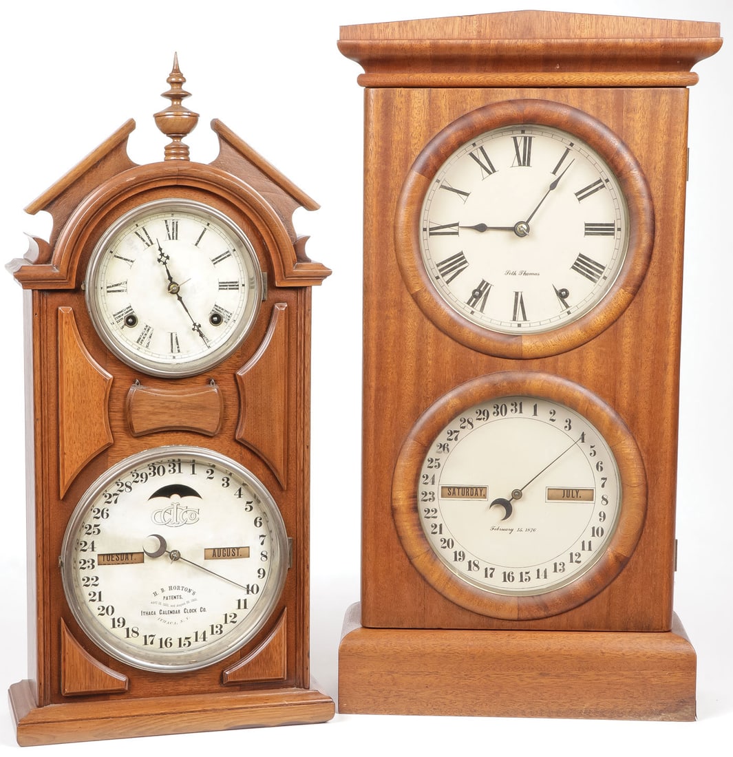 PAIR OF CALENDER SHELF CLOCKS: PAIR OF CALENDER SHELF CLOCKS. Comprising an attractive Ithaca walnut case No. 8 Shelf Library calendar clock with broken pediment and finial. Height 25.25 inches. Together with a Seth Thomas walnut c
