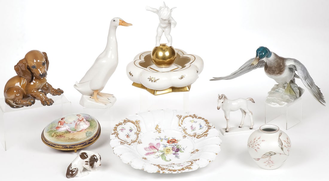 GOOD GERMAN PORCELAIN GROUP: GOOD GERMAN PORCELAIN GROUP. Comprising nine pieces including four Rosenthal examples, including a duck in flight (chip on wingtip), two seated dogs, and a flower decorated vase. As well as a Hutschen
