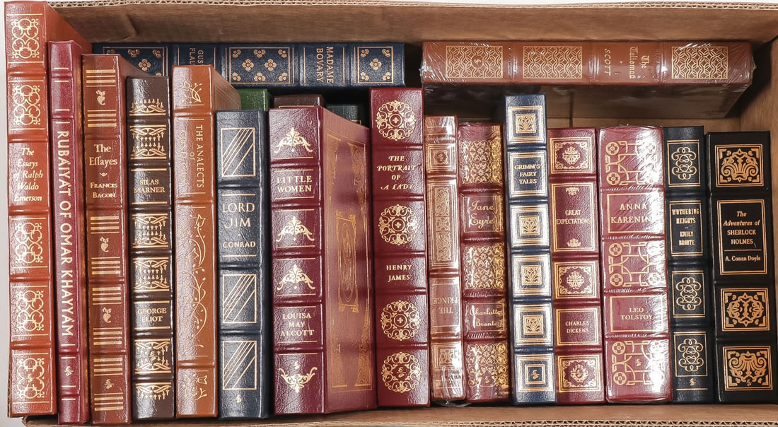 23 EASTON PRESS LEATHERBOUND CLASSICS: 23 EASTON PRESS LEATHERBOUND CLASSICS. Comprising 23 individual books with gilt embossed leather bindings. Including various classics such as Little Women, Lord Jim, Ivan Hoe, Madam Bovary, Moby Dick,