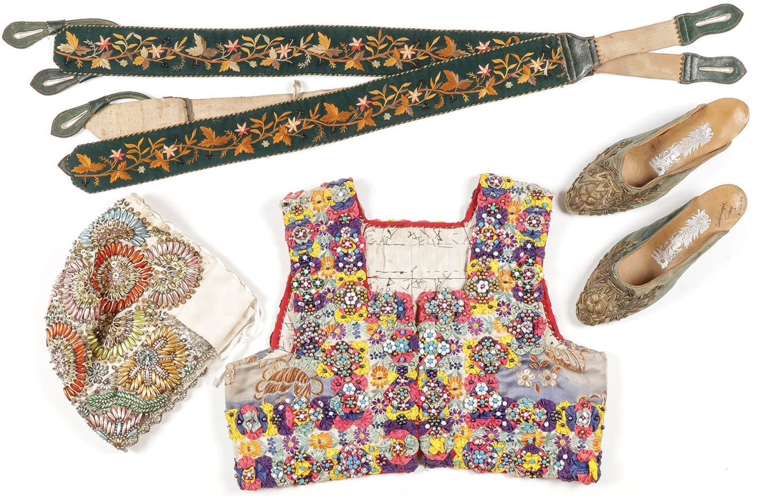 INTERESTING EUROPEAN COSTUME GROUP: INTERESTING EUROPEAN COSTUME GROUP. Including an ornate handsewn Slovak embroidered and beaded child's vest, a Slovak bonnet with blown-glass mercury beads and sequins, a pair of beautifully embroider