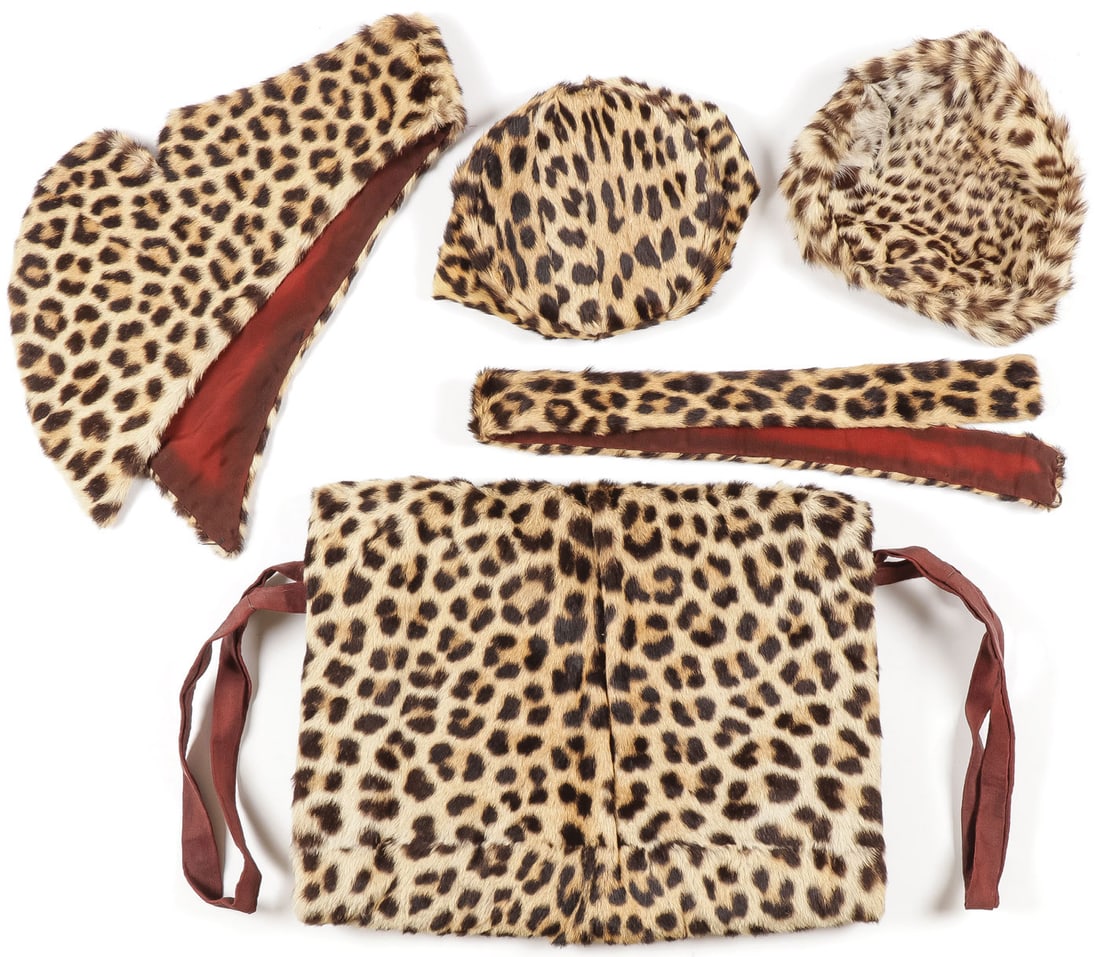 VINTAGE LEOPARD SKIN CLOTHING GROUP: VINTAGE LEOPARD SKIN CLOTHING GROUP. Comprising a large muff, two hats, a collar, and a belt. SHIPPING NOTICE: Except for large, oversized items, Jackson's is your sole and only source for one stop pa