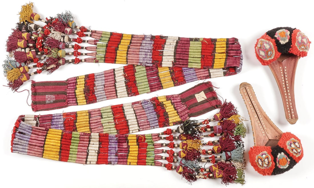 VINTAGE SADDLE SASHES & SHOES: VINTAGE SADDLE SASHES & SHOES. Comprising a pair of middle eastern or Indian sashes with beaded tassels. Length of each 47 inches. Together with a pair of Punjab juttis (shoes), unused. Length 10 inch