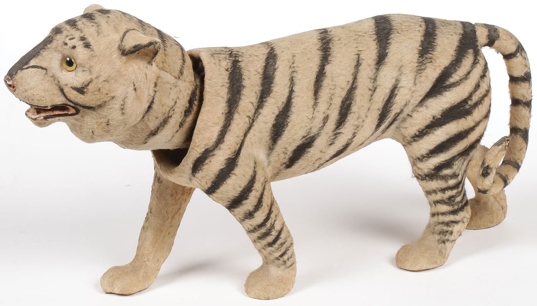 ANTIQUE GERMAN FELT COVERED WIND UP TIGER TOY: ANTIQUE GERMAN FELT COVERED WIND UP TIGER TOY. Missing key, length 12 inches (30.5 cm).SHIPPING NOTICE:Except for large, oversized items, Jackson's is your sole and only source for one stop packing