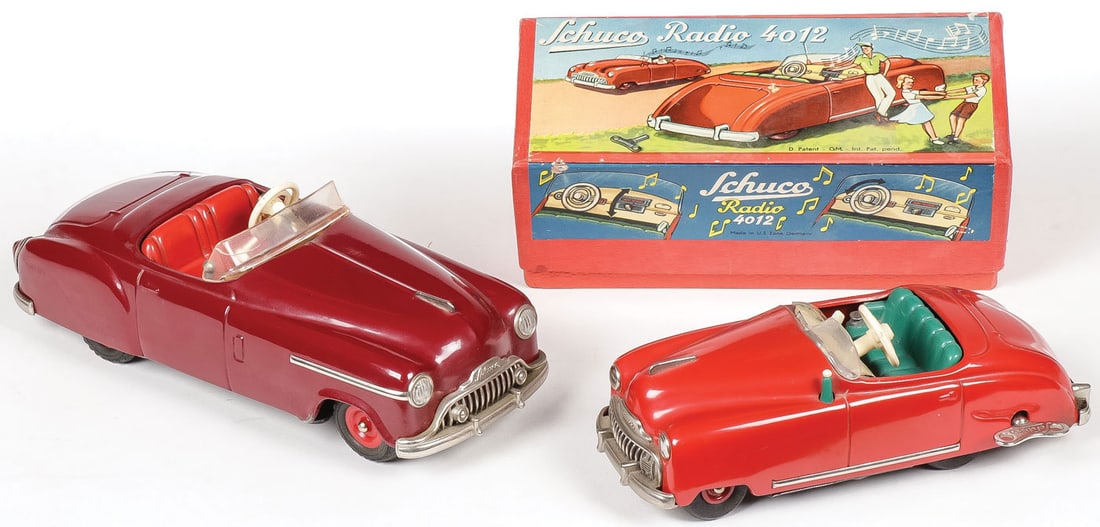 PAIR OF SCHUCO CARS: PAIR OF SCHUCO CARS. Comprising a mint in the box, Schuco radio 4012 car music-box with the original box, paper instruction sheet, and key marked made in U.S. zone Germany. Takes a wind and plays. Tog
