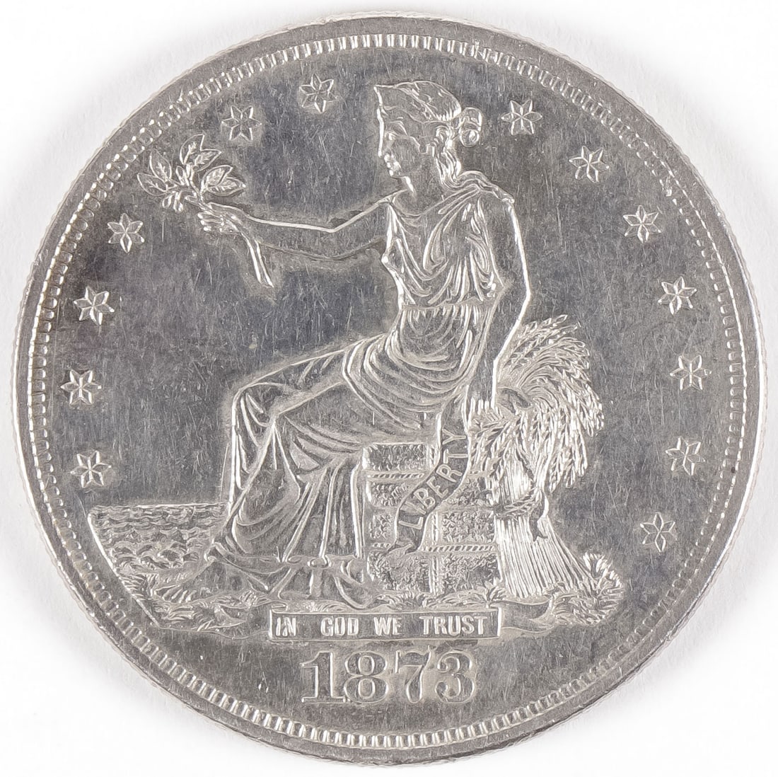 1873 SILVER TRADE DOLLAR & MORE U.S. SILVER GROUP: 1873 SILVER TRADE DOLLAR & MORE U.S. SILVER GROUP Comprising 36 vintage U.S. silver coins, featuring an 1873 silver trade dollar, choice AU/UNC, seven silver 3 cent coins, 1852-1861, eight seated silv