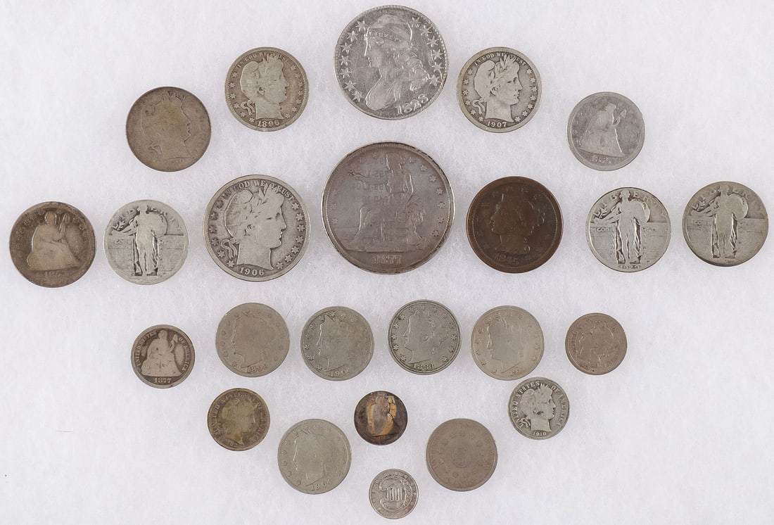 1828 CAPPED BUST SILVER HALF DOLLAR & MORE: 1828 CAPPED BUST SILVER HALF DOLLAR & MORE. Comprising a VG US 1828 silver capped bust ½ dollar, together with 23 other individual coins including an 1877-S Trade Dollar, 1845 Braided Hair US Cop