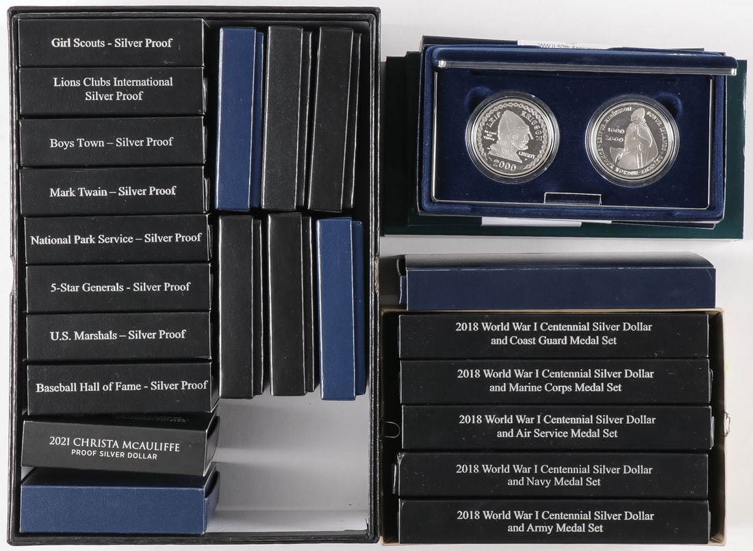 25 ASSORTED US MINT SILVER COMMEMORATIVES AND WW1: 25 ASSORTED US MINT SILVER COMMEMORATIVES AND WW1 CENTENNIAL SETS. Comprising a group of 16 commemorative silver dollars, including a 2011 Medal of Honor commemorative, two 2022 National Purple Heart