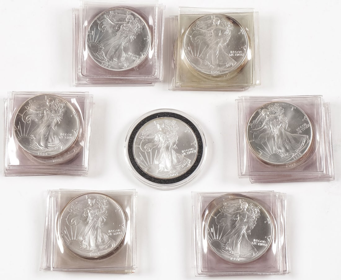 GROUP OF 23 AMERICAN SILVER EAGLE DOLLARS: GROUP OF 23 AMERICAN SILVER EAGLE DOLLARS. Date ranges 1991-2003 all UNC. SHIPPING NOTICE: Except for large, oversized items, Jackson's is your sole and only source for one stop packing and shipping.