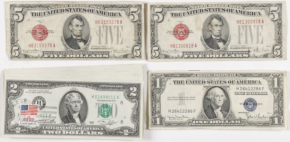 23 STAMPED $2 BILLS SERIES 1976: 23 STAMPED $2 BILLS SERIES 1976. Comprising 23 $2 bills, all stamped and dated in good condition, from series 1976, together with two $5 bills from series of 1928 F, and a $1 Washington Silver Certifi