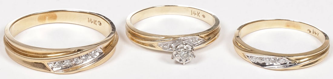 14K YELLOW GOLD & DIAMOND WEDDING RING SET: 14K YELLOW GOLD & DIAMOND WEDDING RING SET. Comprising a women's engagement ring and wedding band (approximately size 5.75) and a men's wedding band (approximate size 9.5), each embellished with accen