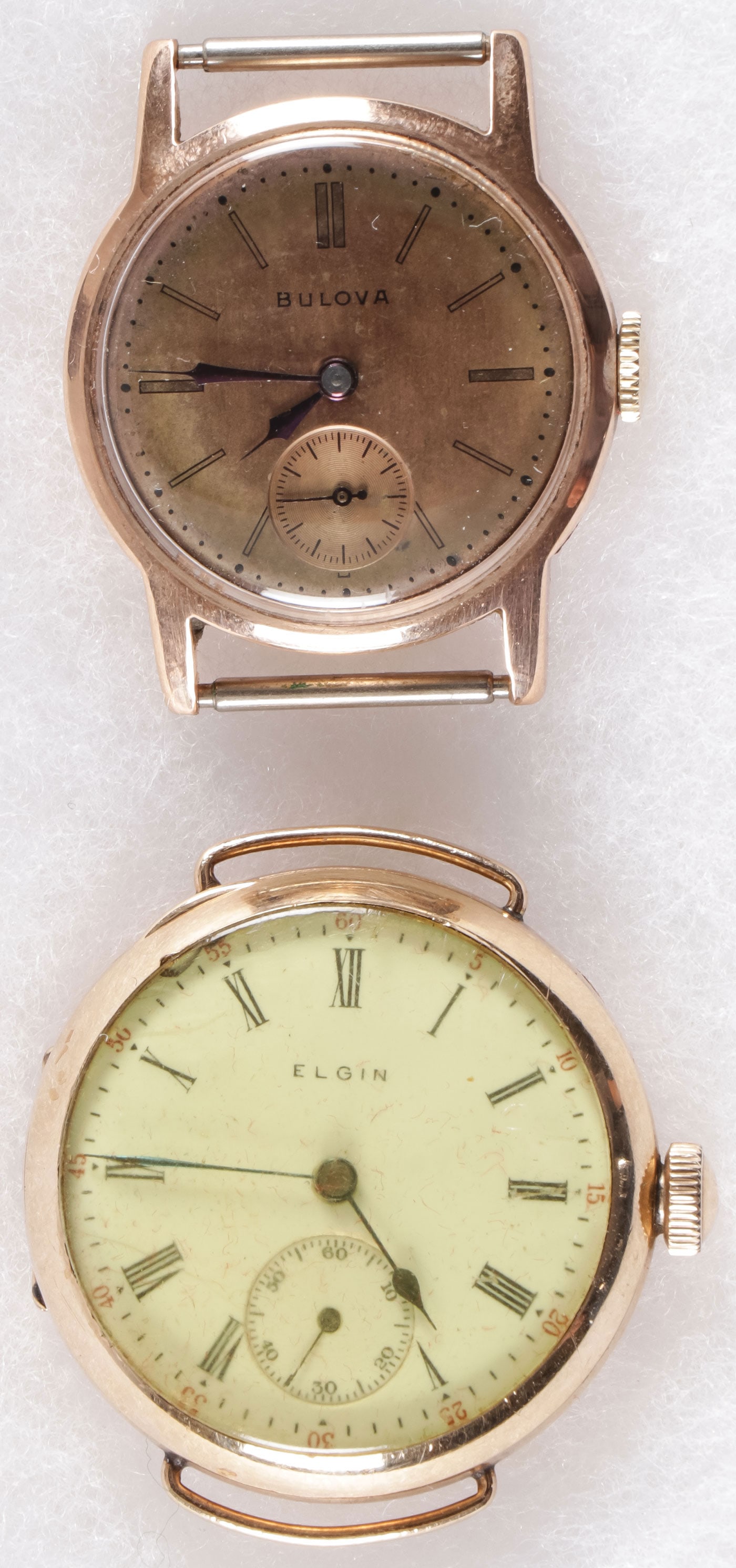 PAIR OF VINTAGE WRIST WATCHES INCLUDING 14K GOLD: PAIR OF VINTAGE WRIST WATCHES INCLUDING 14K GOLD. Comprising a men's Bulova 14Kt gold Admirals wristwatch, circa 1940, serial number on case 5593, gold tone dial with subsidiary seconds, takes a wind