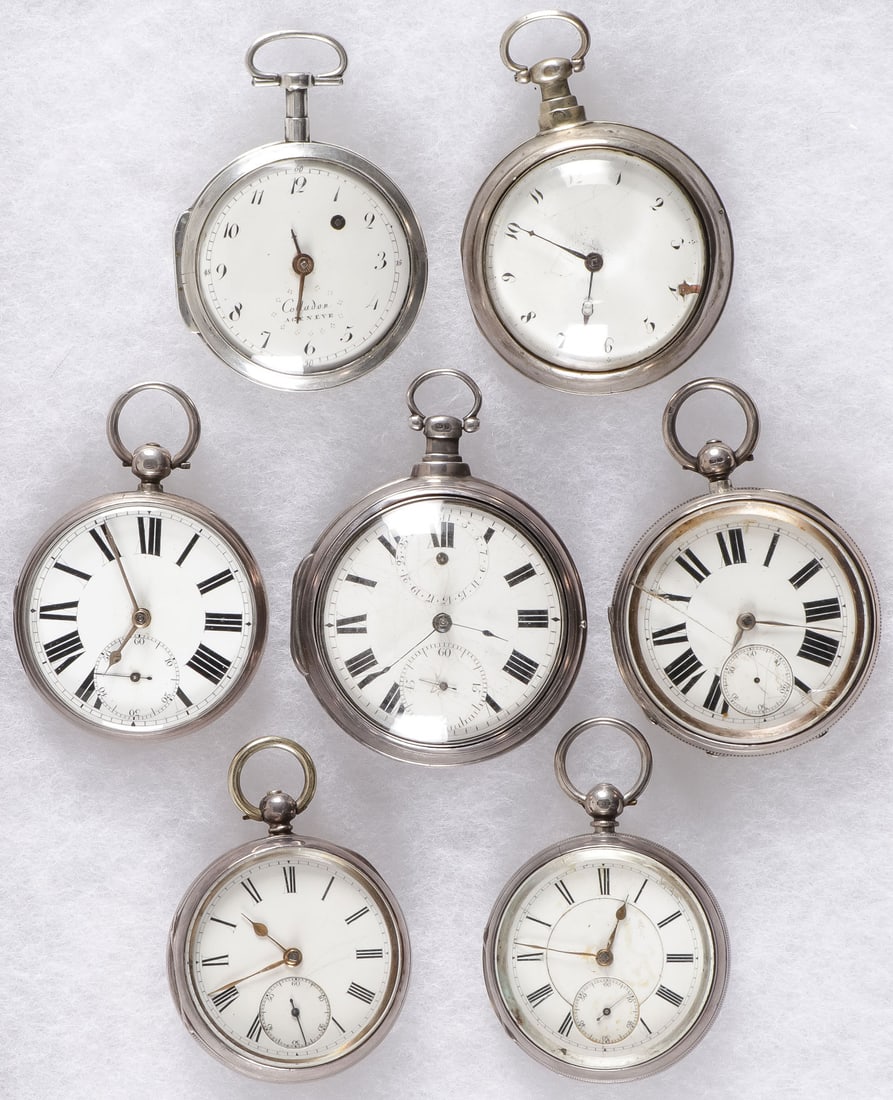 7 SILVER CASE OPEN FACE KEY WIND POCKET WATCHES: 7 SILVER CASE OPEN FACE KEY WIND POCKET WATCHES, 19THC. From top to bottom left to right, open face with swing out gilt fusee marked J. F Schmid, white enamel dial as shown inscribed Colladon A GENEVE