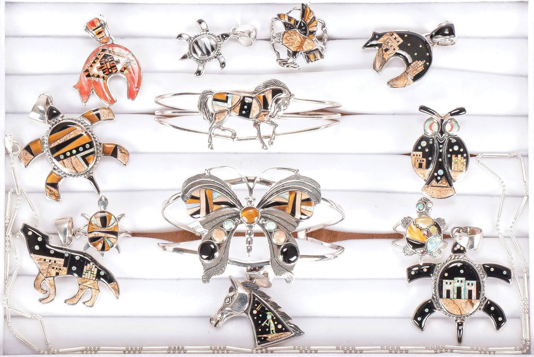 GROUP SOUTHWEST STYLE STERLING INLAID JEWELRY: GROUP SOUTHWEST STYLE STERLING INLAID JEWELRY. Comprising 13 individual items, each of animal form including horses, turtles, birds, and butterfly, including 8 pendants, two cuff bracelets, and three