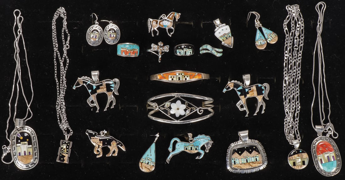 GROUP SOUTHWEST STYLE STERLING INLAID JEWELRY: GROUP SOUTHWEST STYLE STERLING INLAID JEWELRY. Comprising 20 individual items, including 12 pendants, two cuff bracelets, two pairs of earrings, and four rings, of various shape and design, with a var