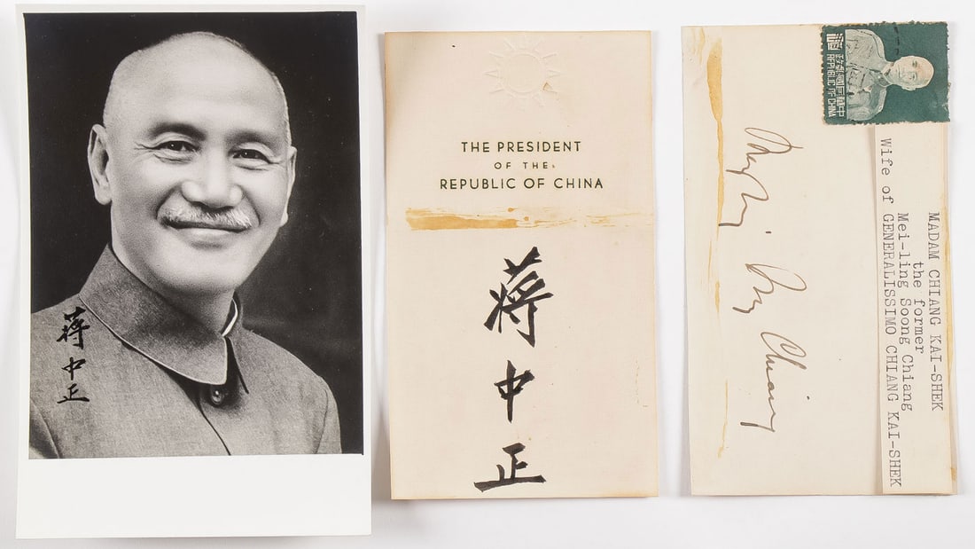 CHIANG KAI SHEK AND MADAME AUTOGRAPHS: CHIANG KAI SHEK AND MADAME AUTOGRAPHS. Comprising a signed 5" x 3.5" signed photo, a signed 3" x 5" embossed card, and a 3" x 5" card signed by Madam Chiang Kai-shek. SHIPPING NOTICE: Except for large