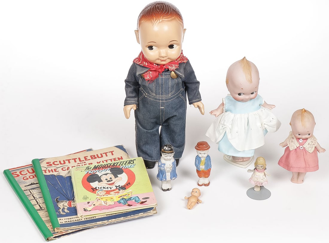 BUDDY LEE, KEWPIE, & DOLL GROUP: BUDDY LEE, KEWPIE, & DOLL GROUP. Comprising a Buddy Lee doll in original denim overalls, height 13 inches, a pair of bisque standing Kewpie dolls, greatest height 8.75 inches, three painted bisque dol