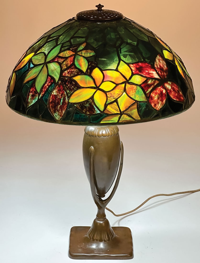A GOOD TIFFANY STUDIOS WOODBINE LAMP, C. 1905: A GOOD TIFFANY STUDIOS WOODBINE LAMP, C. 1905. Comprising a Woodbine leaded shade, 16.25 inches in diameter, interior of rim with TIFFANY STUDIOS NEW YORK metal tag. Resting on a Tiffany Studios #444 