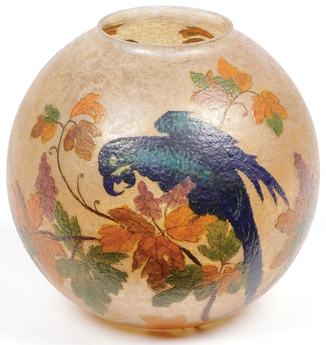 A HANDEL PARROT GLOBE SHADE: A HANDEL PARROT GLOBE SHADE. Reverse-painted with parrots perched on leafy tree branches and with ice chip finished surface. The rim marked Handel and numbered 6996. Diameter of fitter ring 4 inches. 
