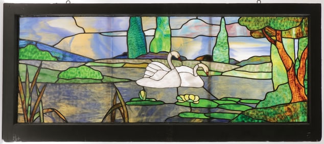 AN ATTRACTIVE LEADED GLASS WINDOW WITH SWANS