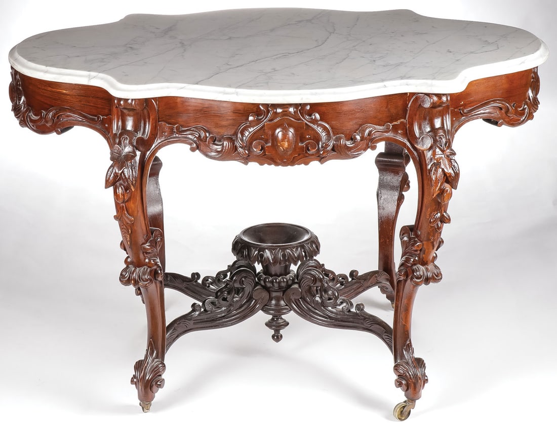 ROSEWOOD ROCOCO REVIVAL PARLOR TABLE: ROSEWOOD ROCOCO REVIVAL PARLOR TABLE. Heavily carved throughout with turtle back marble top with beveled edge. Height 30.5 inches, length 45.5 inches, depth 31 inches. LOCAL PICKUP OR THIRD-PARTY SHIP