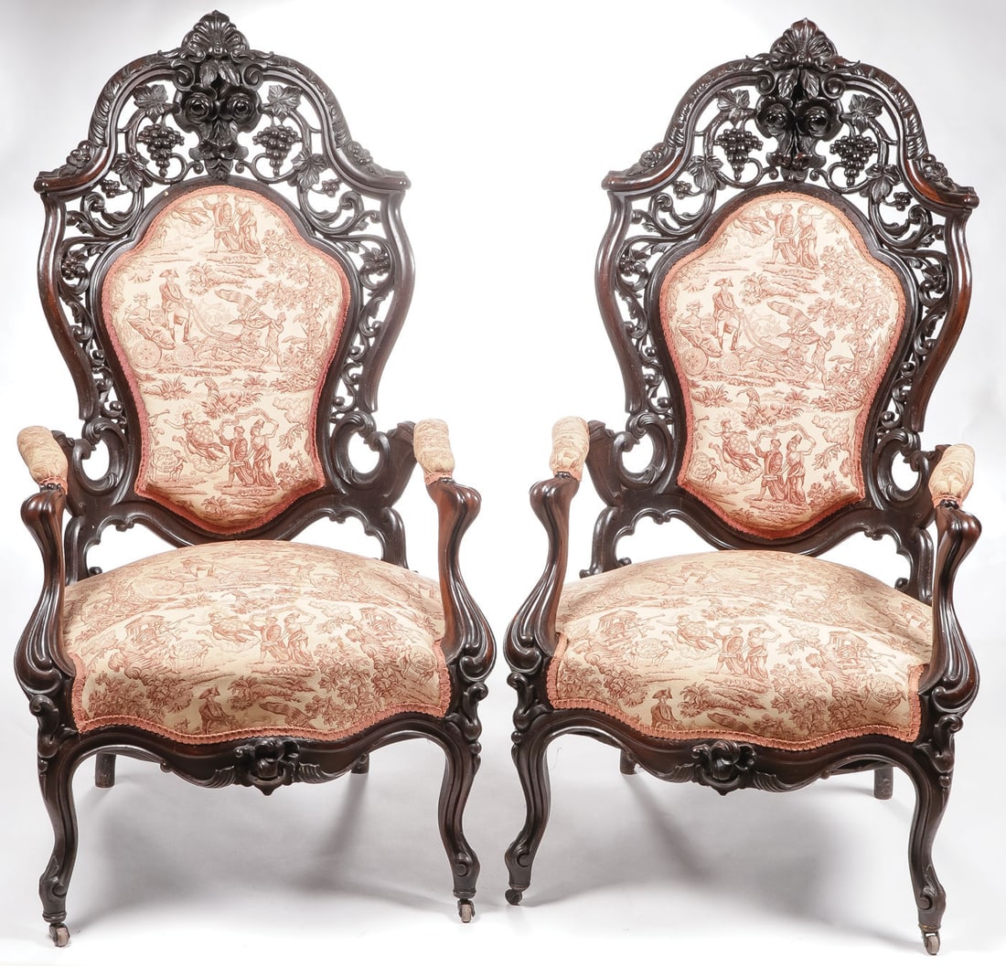 PAIR OF ROCOCO REVIVAL HAWKINS ARMCHAIRS, MEEKS.: PAIR OF ROCOCO REVIVAL HAWKINS ARMCHAIRS, MEEKS. Comprising a pair of matching carved rosewood armchairs. With pierced carved backrest of scrolling grapevines terminating at a floral bouquet and with 