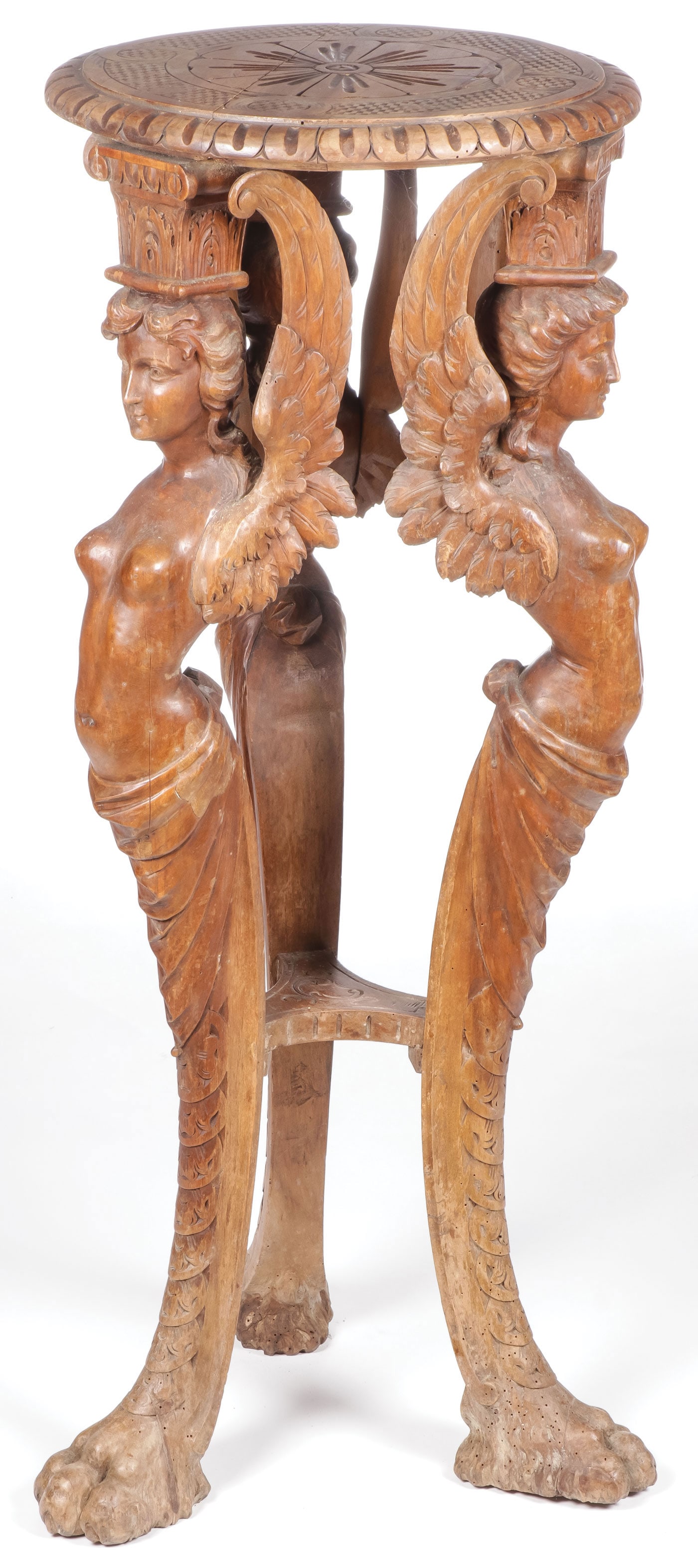 ATTRACTIVE RENAISSANCE REVIVAL CARVED PEDESTAL: ATTRACTIVE RENAISSANCE REVIVAL CARVED PEDESTAL STAND. The three legs with paw feet terminating with finely carved winged harpies beneath Corinthian capitals, supporting a carved medallion surface. Pro