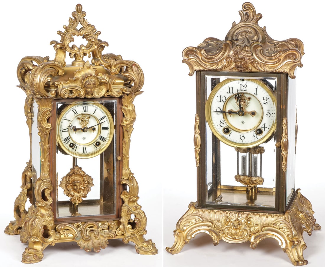 PAIR OF GILDED ANSONIA CRYSTAL REGULATORS: PAIR OF GILDED ANSONIA CRYSTAL REGULATORS. Both with key and pendulums. Both take a wind and run. The one pictured on the left is gilded bronze and measures 18.5 inches in height. The example on the r