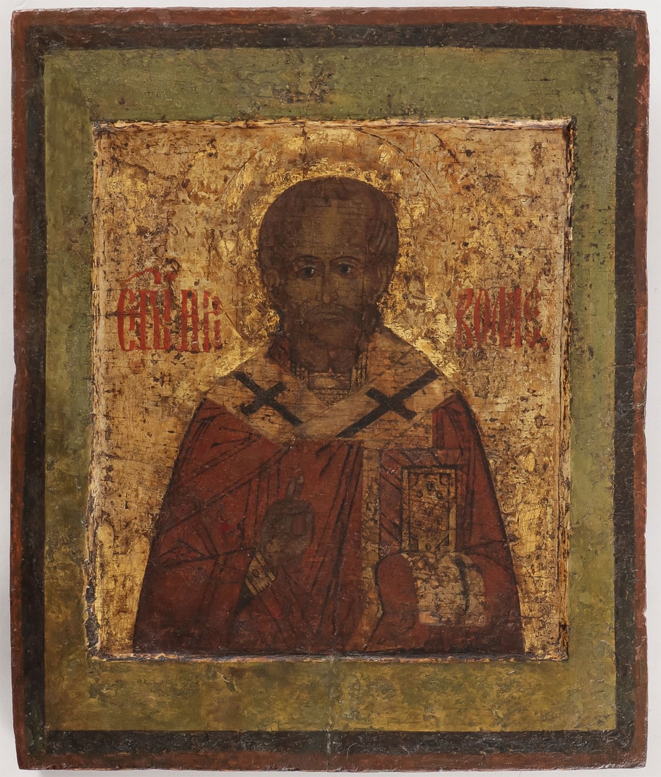 A RUSSIAN ICON OF ST. NICHOLAS, C. 1680: A RUSSIAN ICON OF ST. NICHOLAS, C. 1680. Here Nicholas is attired as a bishop holding a book of gospels and delivering a blessing. 14 inches x 11.75 inches (35.5cm x 30cm). Worldwide in-house shipping