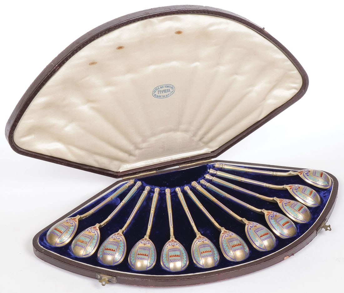 RUSSIAN SILVER & ENAMELED CASED SPOONS, 1884: RUSSIAN SILVER & ENAMELED CASED SPOONS, 1884. Comprising a delightful matching set of 12 silver-gilt and champleve enamel spoons in original velvet lined fitted case with retailer's mark of GRACHEV. H