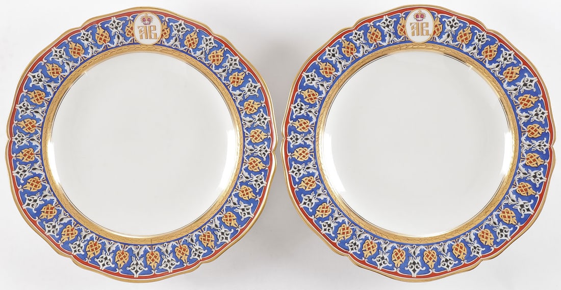 PR KPM GRAND DUKE ANDREI VLADIMIRVICH PLATES: PR KPM GRAND DUKE ANDREI VLADIMIRVICH PLATES. With scalloped gilt rims and strapwork painted borders emblazoned with the cypher AB beneath imperial crown for Andrei Vladimirovich, verso with blue unde