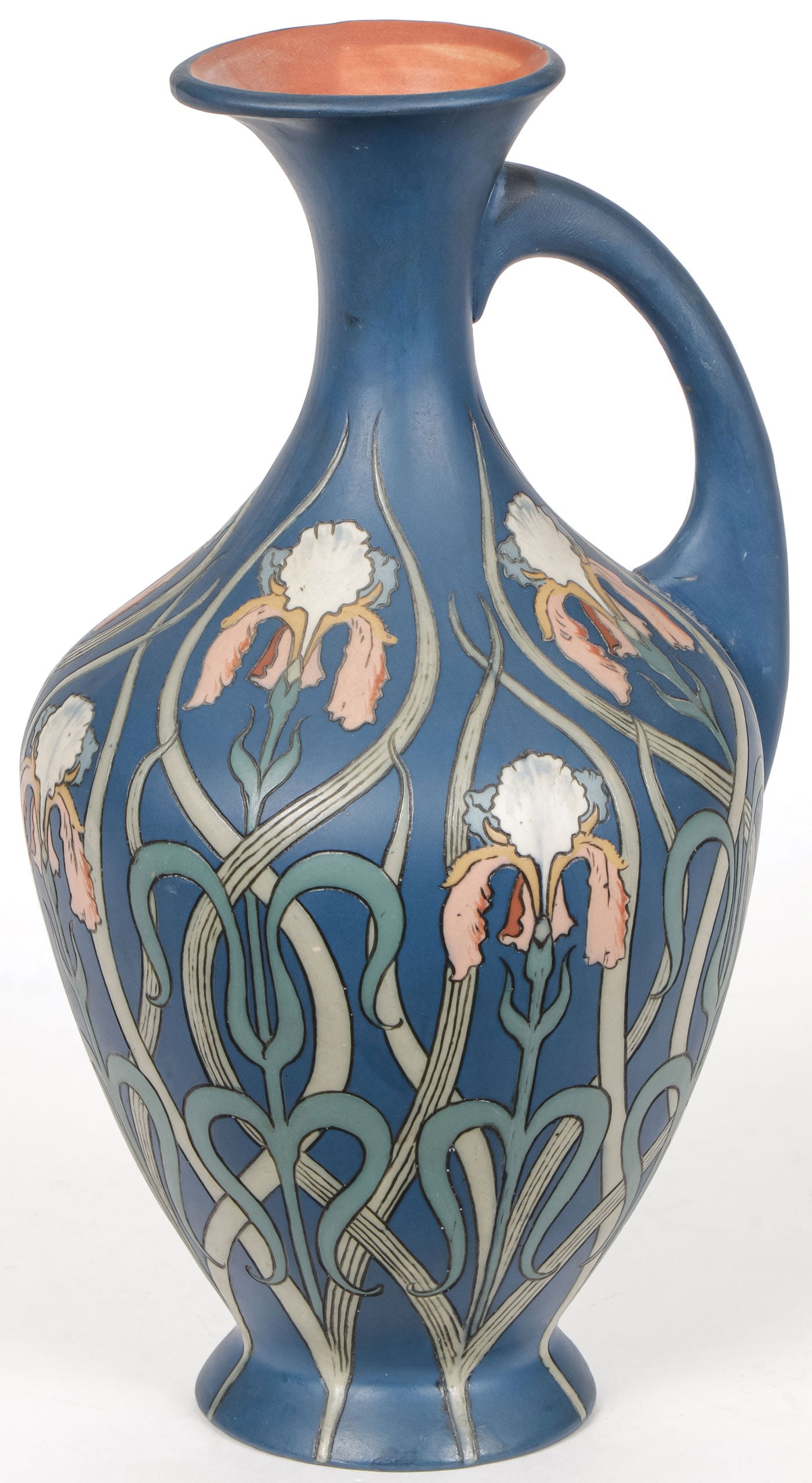METTLACH ART NOUVEAU EWER.: METTLACH ART NOUVEAU EWER. . The sides overall decorated with incised varicolored irises against a blue ground with impressed Mettlach castle mark, mold No. 2433 and date mark 98. Height 8.75 inches (