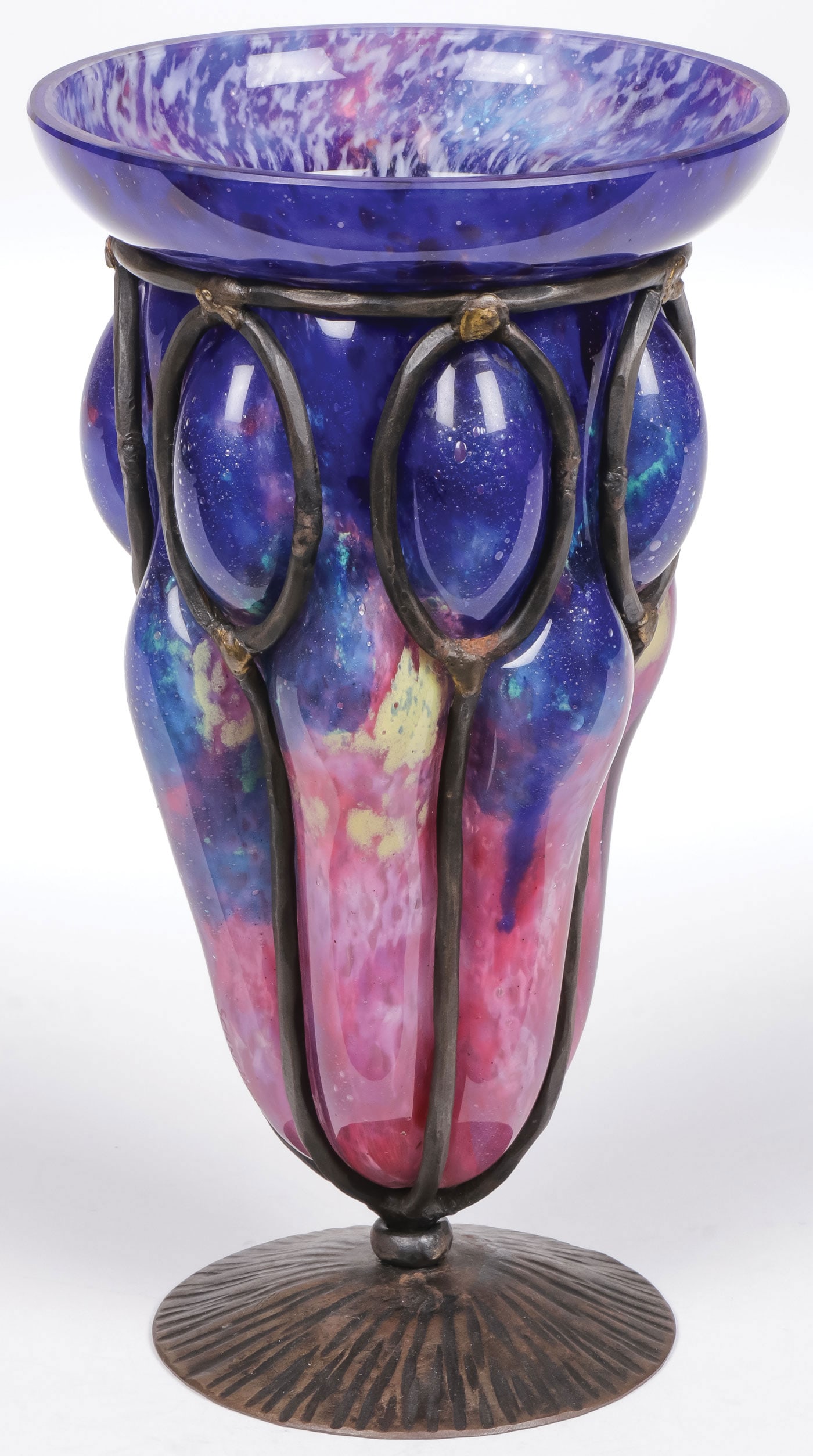 A GOOD SCHNEIDER FRENCH ART DECO VASE: A GOOD SCHNEIDER FRENCH ART DECO VASE. Comprising a cobalt, amethyst, and yellow mottled jade vase, blown into a wrought iron armature and raised on a hammered bell-shaped foot. Etched "Schneider" on