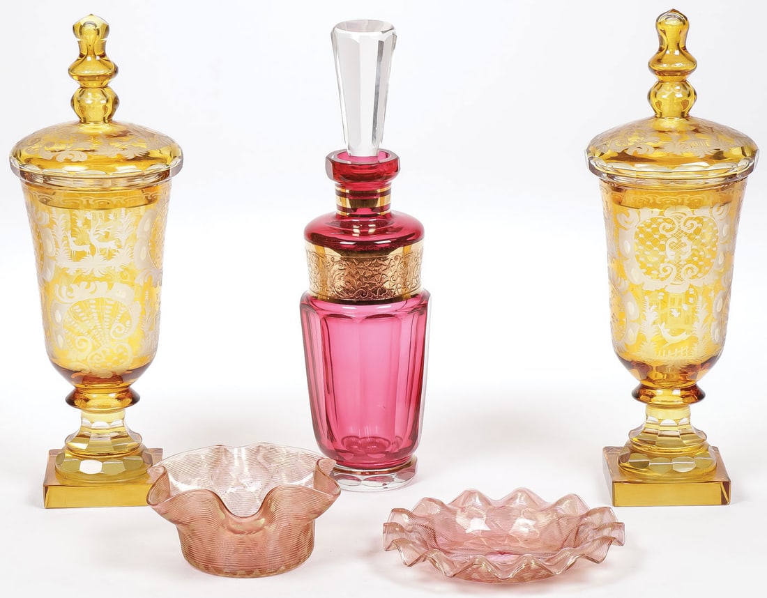 INTERESTING VINTAGE ART GLASS GROUP: INTERESTING VINTAGE ART GLASS GROUP. Comprising four individual pieces including a ruby and gilt decorated cut glass decanter, height 12.5 inches, a pair of exceptional matching Bohemian etched glass