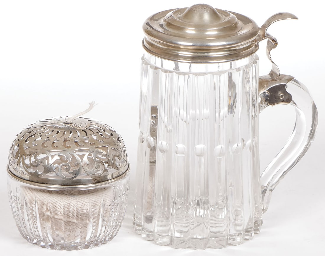 SILVER MOUNTED TANKARD & STRING HOLDER: SILVER MOUNTED TANKARD & STRING HOLDER. Comprising a cut glass tankard with ribbed sides and silver lid engraved with a coat of arms, together with a unique American Brilliant period cut glass string 