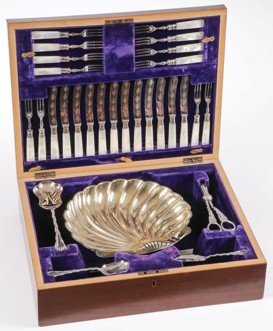 ENGLISH CASED MOTHER OF PEARL FRUIT SET: ENGLISH CASED MOTHER OF PEARL FRUIT SET. Comprising a fine and attractive 29 piece cased fruit or desert set. Comprising a large footed clam shell bowl, grape shears, sugar scoops, 12 mother of pearl