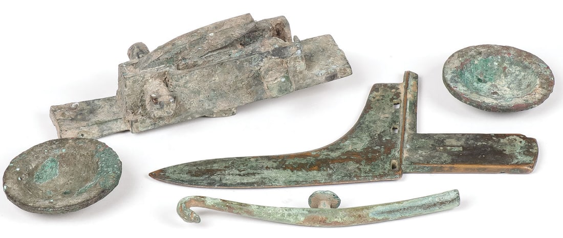 FIVE CHINESE ARCHAISTIC BRONZE OBJECTS: FIVE CHINESE ARCHAISTIC BRONZE OBJECTS. Including a Halberg blade, probably Warring States, a cross-bow lock, also probably Warring States, an attractive belt hook, the end terminating with snake head