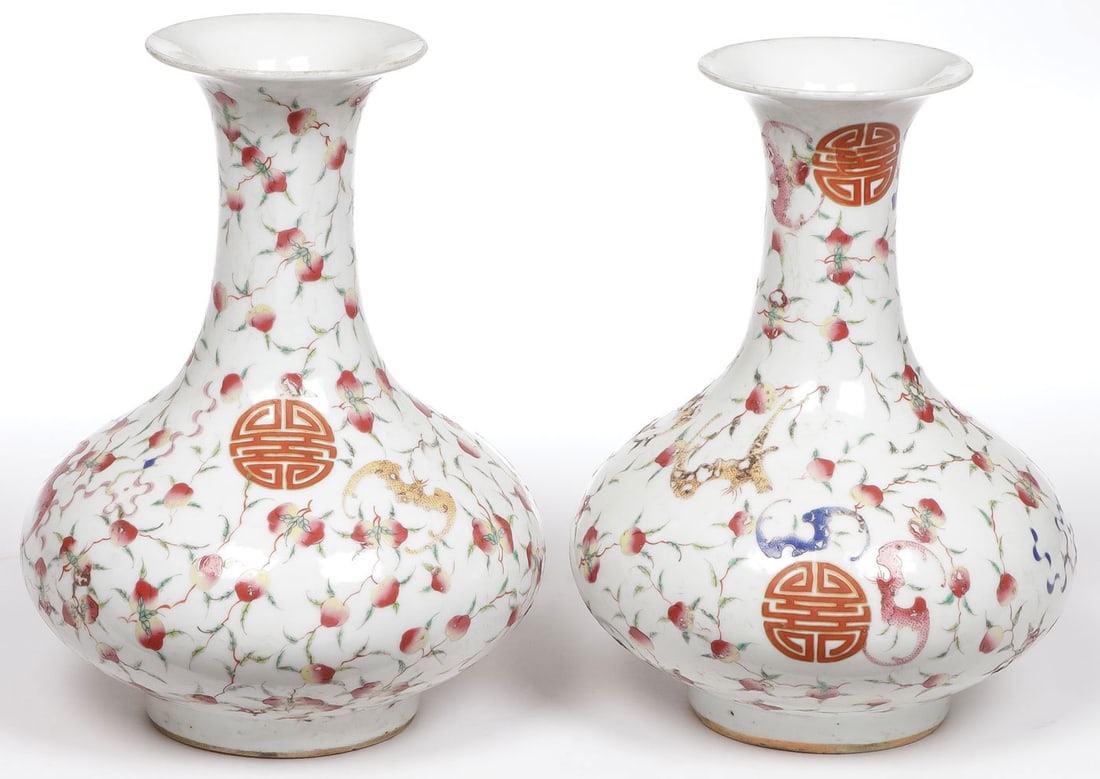 PAIR OF CHINESE ENAMELED VASES: PAIR OF CHINESE ENAMELED VASES. Overall decorated in scrolling vines, peaches, bats and good luck symbols. Underside of base with Guangxu mark. Height 9 inches (23cm). SHIPPING NOTICE: Except for larg