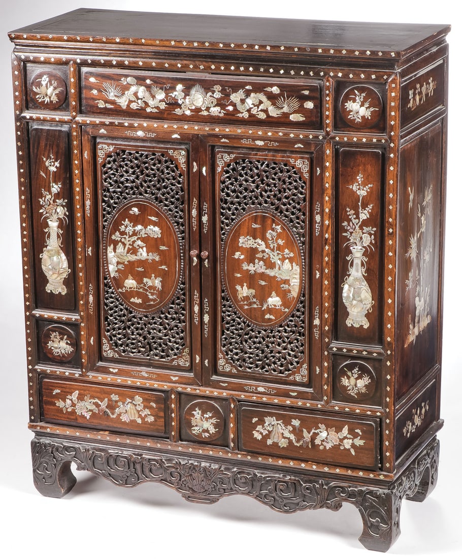 FINE CHINESE INLAID CARVED CABINET, CIRCA 1890: FINE CHINESE INLAID CARVED CABINET, CIRCA 1890. Comprising a finely crafted diminutive cabinet with pierced carved skirt below two drawers and above two ornate pierced carved doors, opening to reveal 