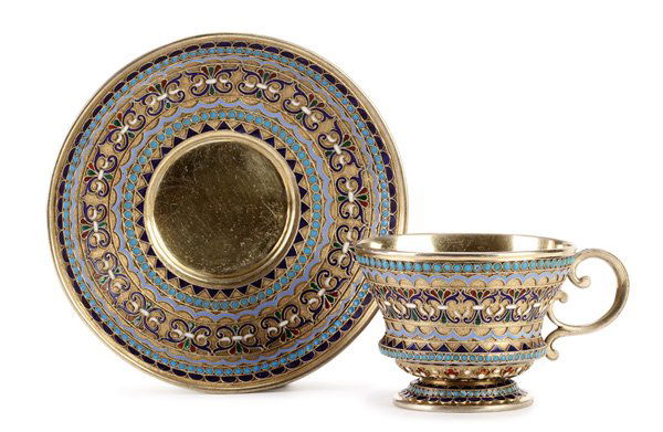 RUSSIAN SILVER & CLOISONNÉ ENAMELED CUP & SAUCER: A RUSSIAN SILVER-GILT AND CLOISONNÉ ENAMELED CUP AND SAUCER, GUSTAV KLINGERT, MOSCOW, 1885. Overall enameled with repeating geometric patterns and beaded banding on a stippled gilt ground. Hallmarked