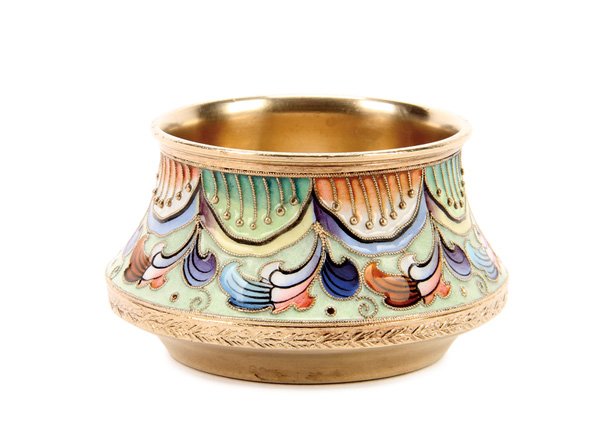A RUSSIAN SILVER-GILT AND SHADED ENAMELED SALT: A RUSSIAN SILVER-GILT AND SHADED ENAMELED SALT, 6TH ARTEL, MOSCOW, 1908-1917. The sides enameled with florals on a mint green ground and with silver beading inside multi-colored swags, the interior gi