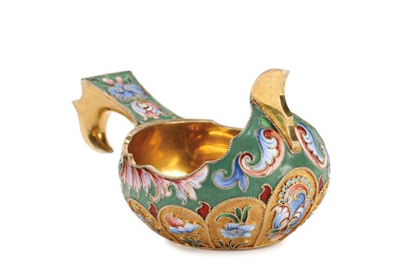 A RUSSIAN SILVER-GILT AND SHADED ENAMEL KOVSH: A RUSSIAN SILVER-GILT AND SHADED ENAMEL KOVSH, MOSCOW, 1899-1908. The sides banded with arched reserves displaying shaded enamel flower forms on a stippled gilt ground and the rim and hook handle in g