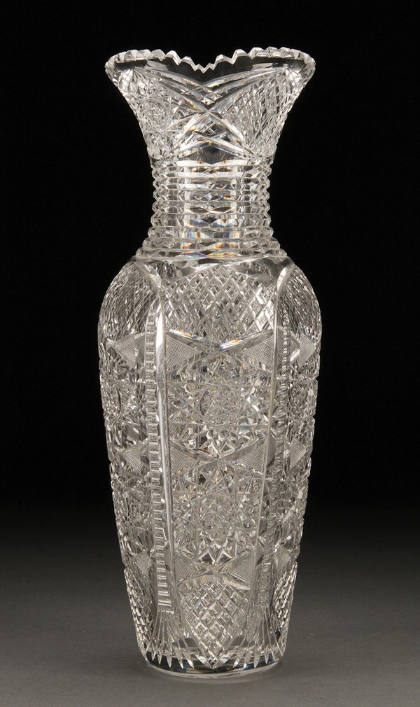 AMERICAN BRILLIANT CUT GLASS TABLE VASE: A LARGE AND IMPRESSIVE AMERICAN BRILLIANT CUT GLASS TABLE VASE, EARLY 20TH CENTURY. Of baluster form, finely cut with hobstars in five panels below a horizontal rib cut neck. Height 17 inches (43 cm).