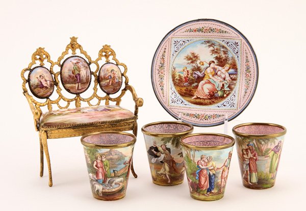 6 VIENNESE ENAMELED CABINET OBJECTS: A SIX PIECE GROUP OF VIENNESE ENAMELED CABINET OBJECTS, 19TH CENTURY. Comprising a gilt metal framed settee with enameled cushions, four matching tumblers with classical scenes and diaper ground inter