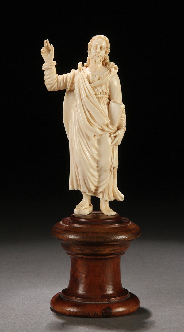 A GOOD FRENCH CARVED IVORY FIGURE OF CHRIST: A GOOD FRENCH CARVED IVORY FIGURE OF CHRIST, 18TH CENTURY. Carved in fine detail with good facial features, curly hair and flowing robe with deep folds. Depicted in standing form with right hand rais