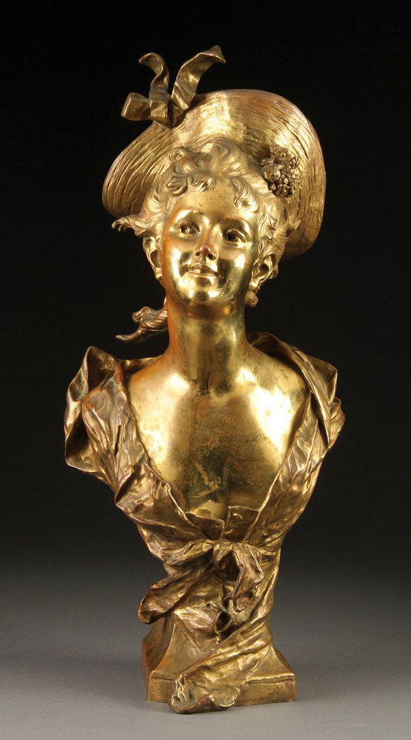 FRENCH BRONZE, YOUNG BEAUTY, HIPPOLYTE MOREAU: HIPPOLYTE MOREAU(French 1832-1927)A Young Beauty Wearing Hat Bronze with gold patinaInscribed “Hip Moreau”Height 23.5 inches (59.7 cm)