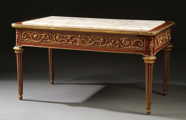 LOUIS XVI STYLE MAHOGANY LOW TABLE (NECESSAIRE): A LOUIS XVI STYLE MAHOGANY GILT BRONZE AND MARBLE TOP LOW TABLE (NECESSAIRE), IN THE MANNER OF JEAN-HENRI RIESENER, LAST HALF 20TH CENTURY. Finely mounted with elaborate scrolled foliate reticulated